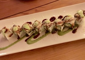 Eel roll with basil drizzle